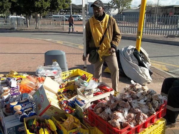 Madiba Kanana sells sweets, snacks and cool drinks. Business is so bad he can’t even give his customers change for R20.