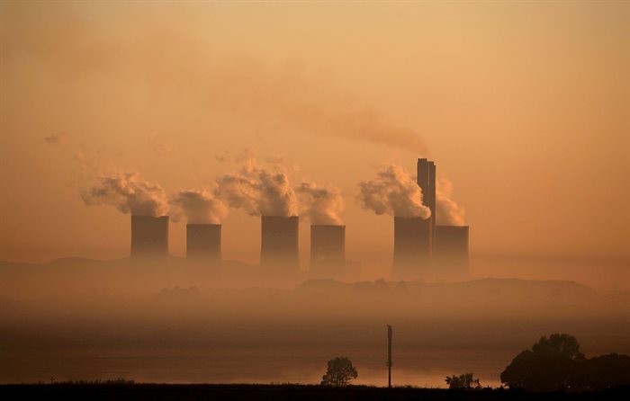 Steam rises at sunrise from the Lethabo Power Station near Sasolburg. Reuters/Siphiwe Sibeko